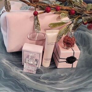 Viktor & Rolf and Dior perfume sets in Dior makeup bag